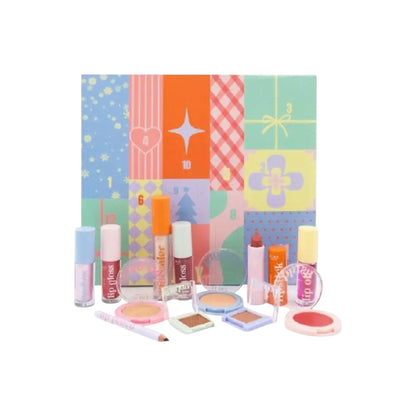Calendario de Adviento Le Due Make Up con 12 sorpresas de maquillaje en compartimentos numerados, productos