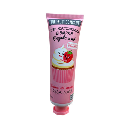 Crema de manos The Fruit Company Fresa Nata 50 ml en tubo rosa con dibujo de fresa y nata.