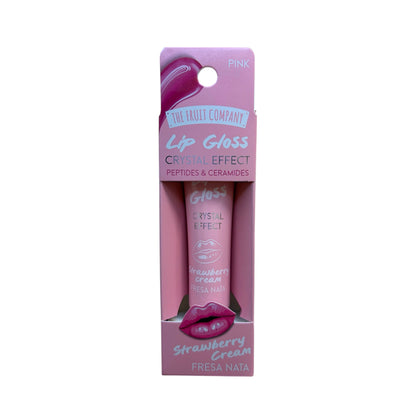 Brillo de labios The Fruit Company Lip Gloss Crystal Effect Pink con aroma a fresa y nata, péptidos y ceramidas, en envase rosa.